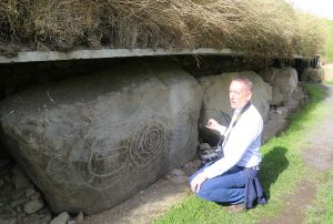 Anthony Murphy guides a Thin Places tour at the Knowth monument