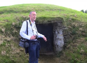 Anthony Murphy guides a Thin Places tour at the Knowth monument